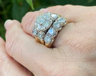 #150 - 14kt yellow gold fifteen stone,cast made ring, with 24kt white gold top. fourteen, round, full cut diamonds 0.25ct each. (SI 1- F-H range) & one round brilliant cut diamond of about .51 ct (SI-2 - F-H range). Size 10- Appraisal & price available upon request.