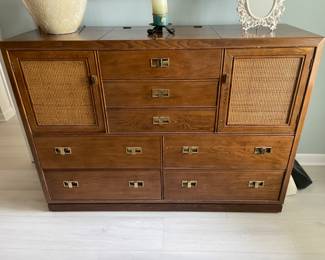 Beautiful campaign style bedroom suite by Thomasville.  Buy the whole set of a single piece.     Gentleman’s chest with unique storage