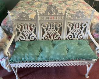 Antique heavy, ornate wrought iron bench