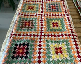 Hand -pieced quilt, machine quilted