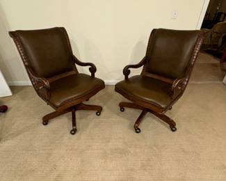 office chairs in leather and carved wood 