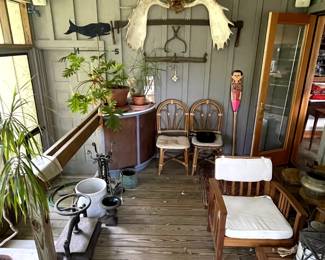 Moose antlers, book press, whale weathervane