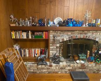  books and Knick nacks to the left are 2 portable cribs, which could be used for anything like even a raised flower garden with some repurposing 😃