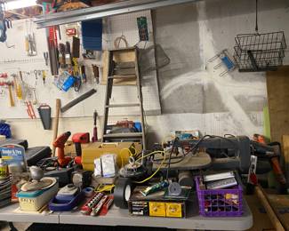 wooden ladder, metal basket that hooks on hitch, small tools, like sanders and screw guns