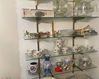 elongated salt and pepper shakers, tea set, large bowls and plattters