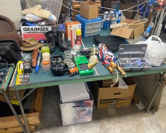 ping pong table, ear muffs, umbrellas, dremel, shop towels