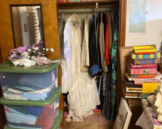 Wedding dress, fabric in totes, magazines, board games…