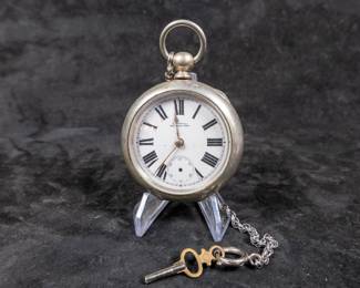 Antique American Waltham pocket watch with key in a Keystone Silveroid watch case. 57.5mm case size.