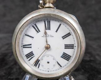 Antique American Waltham pocket watch with key in a Keystone Silveroid watch case. 57.5mm case size.