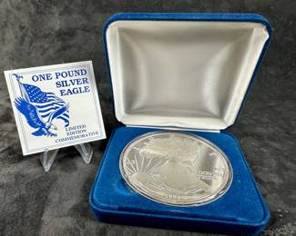 A 1 Troy Pound limited edition commemorative 1998 Silver Eagle. Comes with a Certificate of Authenticity.