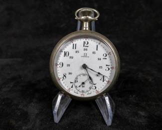 Antique Omega winding 17 jewel, two position silver pocket watch. Winds up and runs, but appears to need some servicing to function properly. Movement appears to be Swiss by Regina Watch Co. 50mm case size and approx. weight of 86.11 grams.