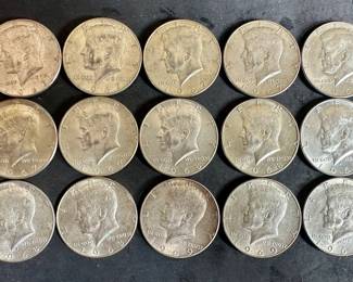 Fifteen 40% silver Kennedy Half-Dollars. Seven 1967, five 1968D, and three 1969D.