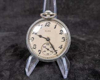 Vintage Bulova 17 jewel Swiss pocket watch in good running condition with 5 adjustments in a nickel case by Illinois Watch Case Company. 44.5mm case size.