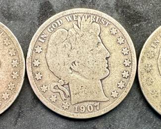 A 1900, 1907, and 1907 S Barber Half Dollar. Estimated condition Good-Fine.
