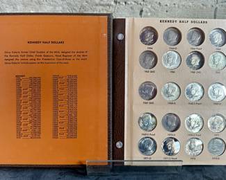 A Dansco Kennedy Half-Dollars coin folder including proof-only issues, partially complete. 52 coins in total.
