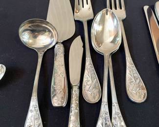 Tiffany & Co. Audubon 925 Sterling Flatware 104 pc in total.  Includes: 16 each of Dinner Knives, Dinner Forks, Salad Forks, Teaspoons; 8 soup spoons; 15 butter spreaders; 10 appetizer or seafood forks; and the following serving pieces- a pie server, spreader, meat fork, cold fork, 2 serving spoons, and a soup ladle. 