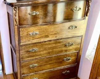 Antique chest of drawers with backspash and applied moldings