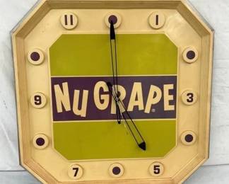 UNUSUAL NU GRAPE PLASTIC DEALER CLOCK