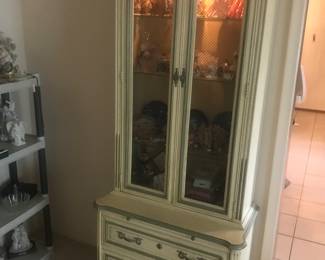 Provincial finish tall and narrow curio cabinet with interior lighting and 2 drawers!