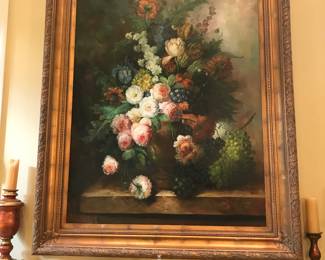 Large framed painting with light above main fireplace!