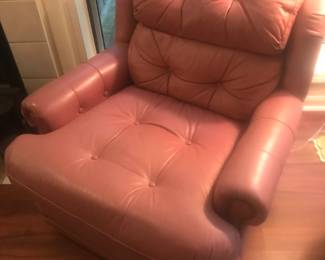 One of 2 matching leather chairs with matching ottoman!
