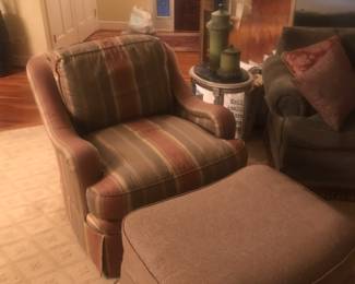 Swivel's and rock with contrasting rolling ottoman!