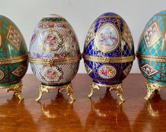 Four Limoges China Hinged Eggs with Attached Stands