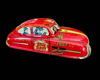 TIN WIND UP TOY FIRE CHIEF # 1 .....VINTAGE