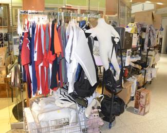 Cardinal Shirts, Sports T-Shirts, Awesome Hiking Bags, Child Display, Clothing Rack with Basket, Pillows and Blankets.  
