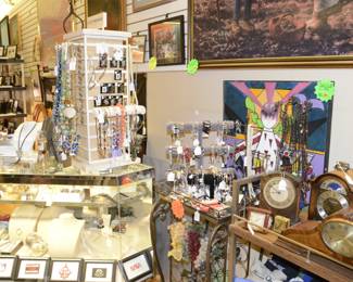 Jewelry, Clocks, Art work, Jewelry cabinet, wine rack, display the clocks are on. Jewelry display for necklaces. 