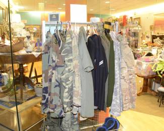 Military Clothes both vintage and Camo. Army, Navy, pilots parachute holder.