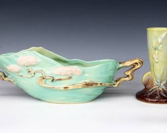 Two pieces of mid 20th century Roseville Art Pottery with lustre glaze.  Includes an oval center bowl with multi-color "Ming" Tree decoration and Green glaze, and a "Wincraft" tapered vase with multi-color floral decoration and Yellow/Brown glaze.  Molded "Roseville / U.S.A." marks, center bowl with "528-10" and vase with "281-6" model numbers.  Minor wear, some crazing.  6 1/4" and 12" high.  ESTIMATE $50-100
