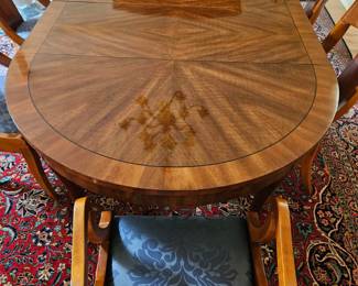 Gorgeous Baker Dining Table With 2 Leaves. Measures 48 x48" when closed and each Leaf is 18" wide
