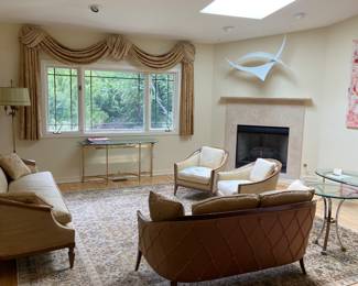 Immaculate Living Room With Custom Covered Sofas and Chairs