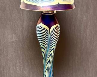 Beautiful hand blown art glass table lamp in the style of Tiffany but made more recently.  It is signed and numbered.   Similar to Swallowtail Studios