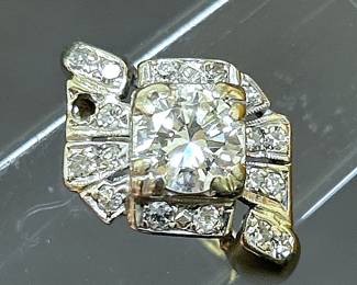 Vintage 1.25 carats diamond set in 14k white gold and surrounded by 17 round diamonds that total 0.17carats (The 18th diamond is missing).   This ring is from the Highland Park Estate of an Accomplished woman and is being offered for sale in this Corsicana Estate.