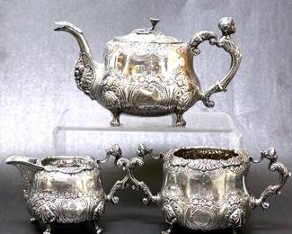  1800s sterling tea service made by William Nolan of Dublin, Ireland as indicated by the Hallmarks.  It also has the retailer's mark of West for Jacob West of Dublin.  