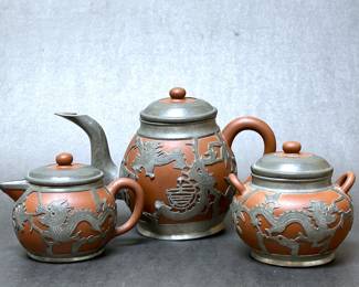 Antique Chinese terracotta tea set with pewter details 