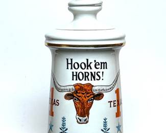 Vintage porcelain empty Old Fitzgerald Stitzel Weller Distillery Whiskey bottle for UT's three straight victories, 1968, 69 & 70