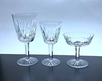 Waterford Lismore.  There are eight water goblets, eight wine goblets and eight champagne sherbets 