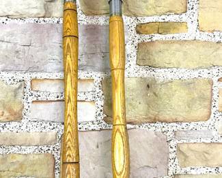 Old wooden fishing rod handles 