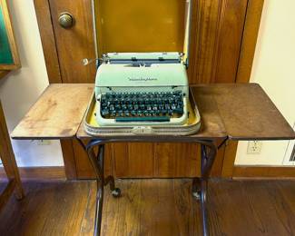 Vintage Remington portable typewriter and a typewriting table