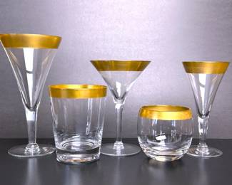 Mid century Dorothy Thorpe Golden Band glassware that were purchased through Sanger Harris.   There are six water goblets, six double old fashions, six tall champagnes, six roly polies and six wine stems.  