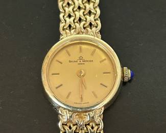 Vintage 14k Baume & Mercier ladies wristwatch that works  .....To register so you can place bids go to www.capitolsalesservices.hibid.com 