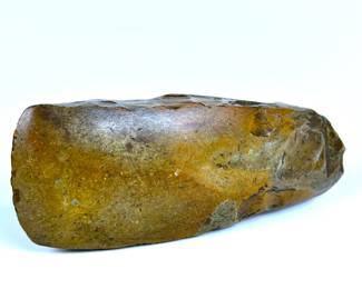 An Ancient Scandinavian thick butted stone axe head that was could possibly from the Neolithic period (Funnel Beaker Phase).   This was found by the consignors father when he was a teenage in the 1920s on his grandfather's farm that was near the town of Ringkøbing  .....To register so you can place bids go to www.capitolsalesservices.hibid.com 