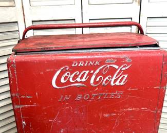 Vintage Coca Cola Cooler for bottles  .....To register so you can place bids go to www.capitolsalesservices.hibid.com 