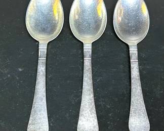 Three 1930s Art Deco sterling silver serving spoons made in Denmark by Georg Jenson in the Continental pattern  .....To register so you can place bids go to www.capitolsalesservices.hibid.com 