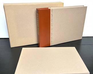 Book,  Buffalo Guns & Barbed Wire Two Frontier Accounts by Don Hampton Biggers.  1 of 260 copies bound in quarter cowhide, with extra suite the photographs in a separate folder, together houses in a slipcase.   Published in 1991 by the Texas Book Club with an introduction by A. C. Greene .....To register so you can place bids go to www.capitolsalesservices.hibid.com 