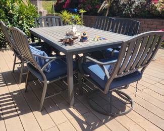 Patio set with 6 chairs, table and umbrella anchor