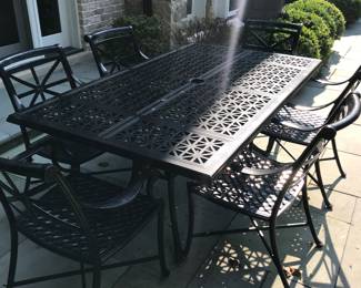 Wrought Iron table and 6 chairs $850